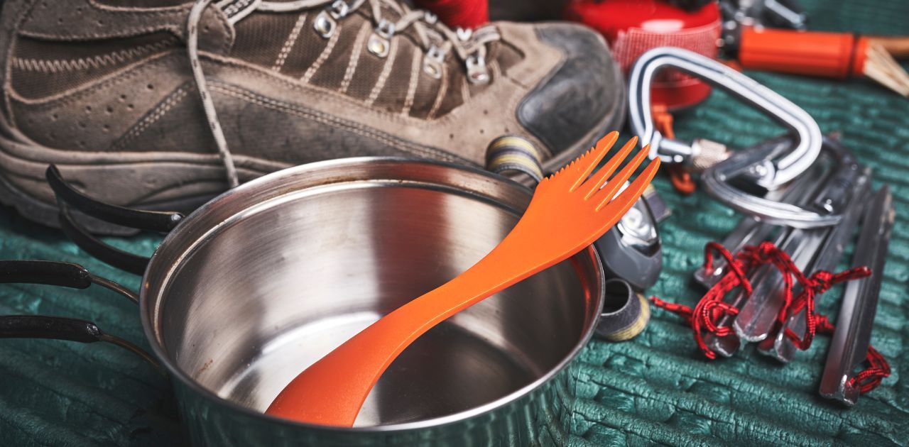 camping items like cookware and tent stakes