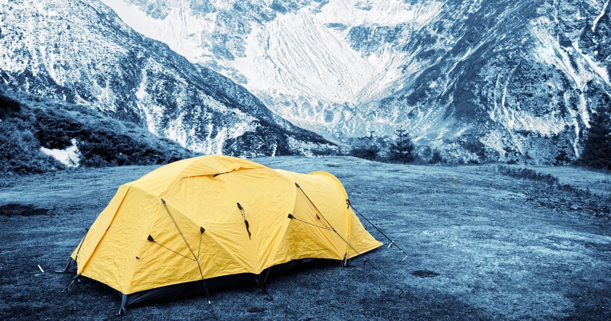 4 season expedition tent in front of mountain range