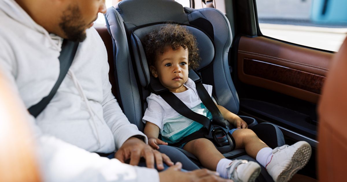 boy in car seat