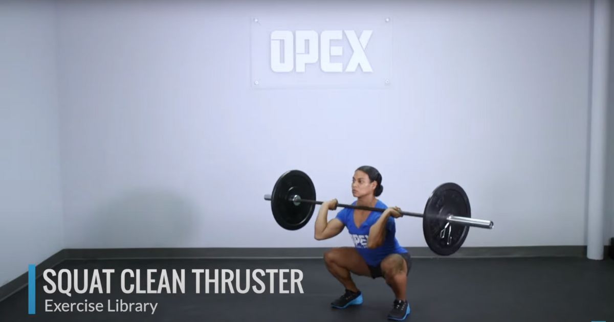 woman in full front squat position of cluster