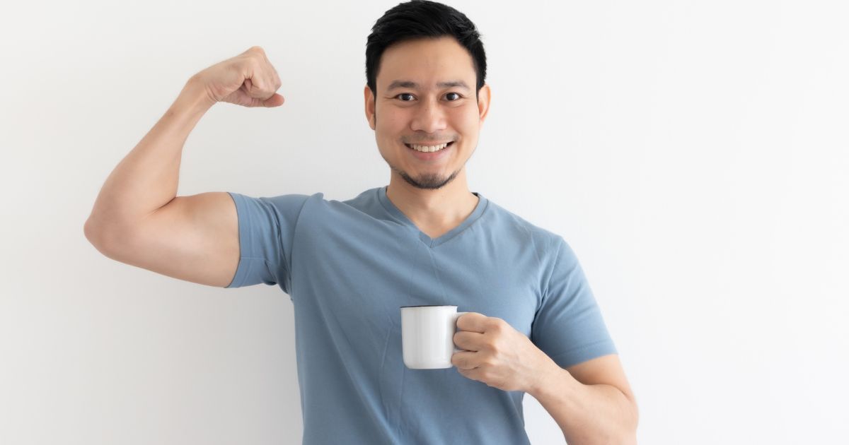 happy healthy man drinking a cup of tea
