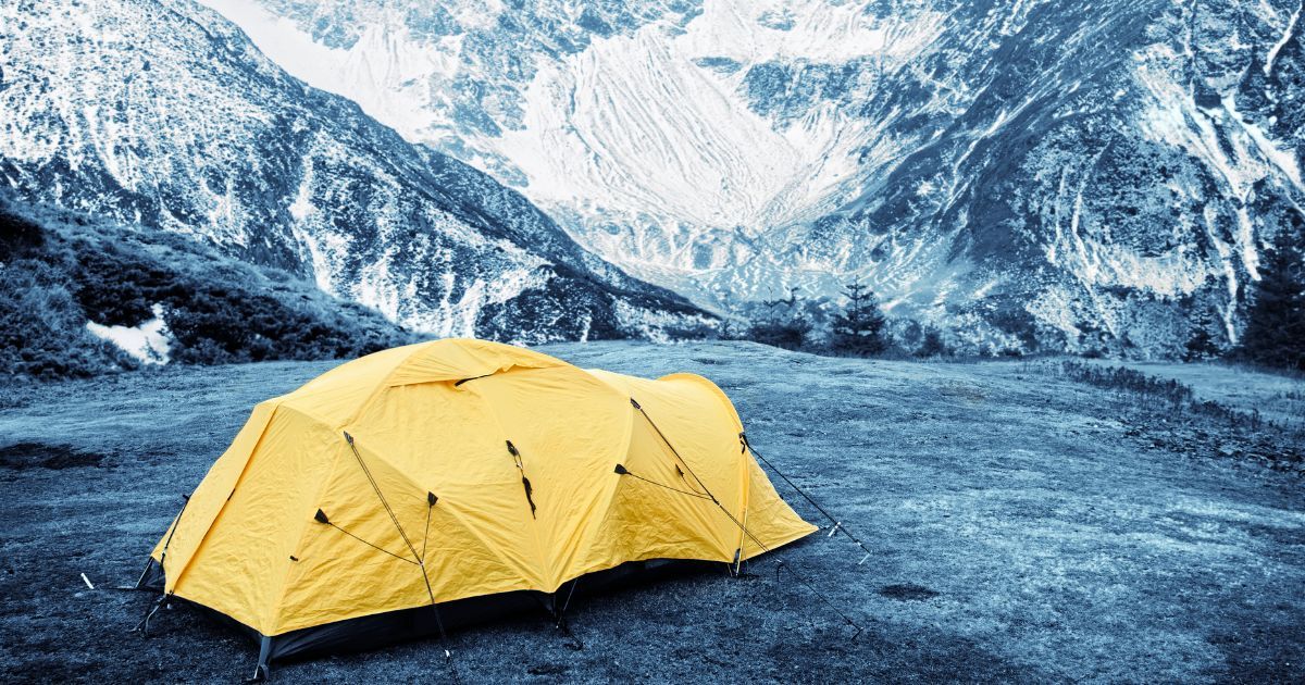 4 season tent setup in snow mountains