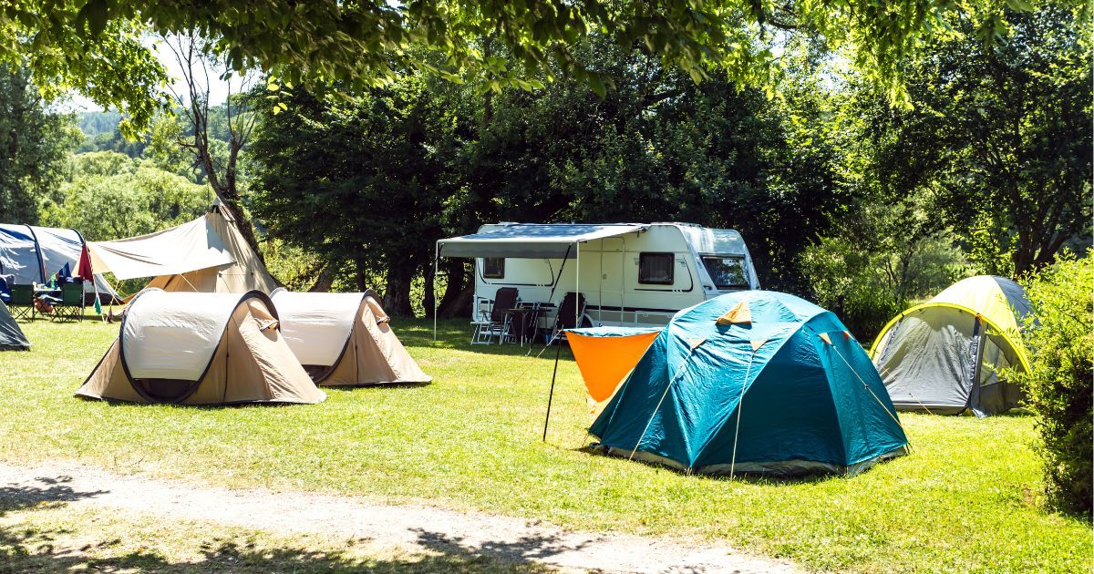 multiple tents setup at campsite