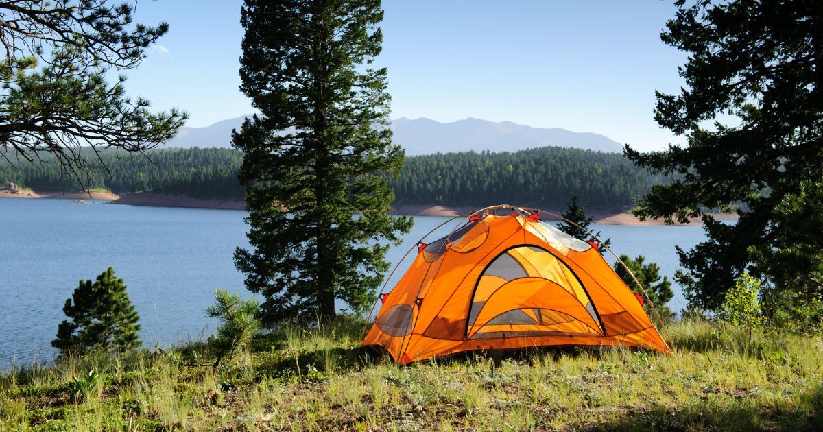 tent setup in the backcountry by a lake
