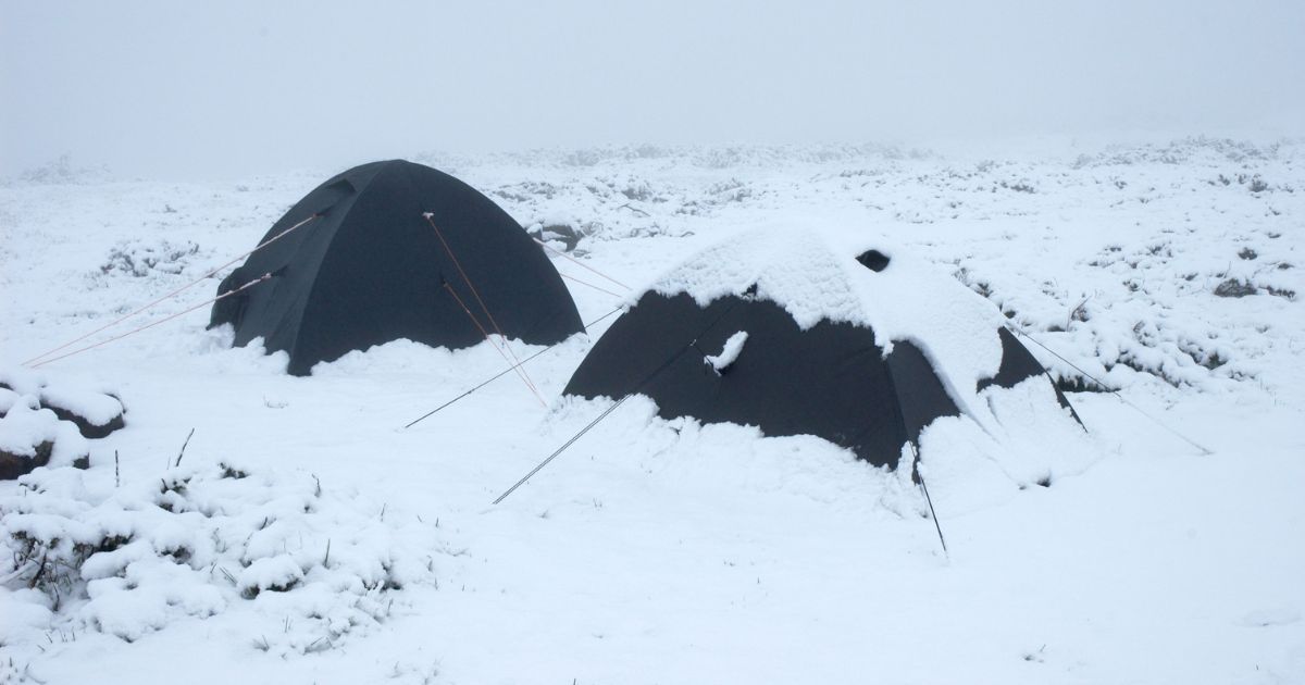 tents covered in snow